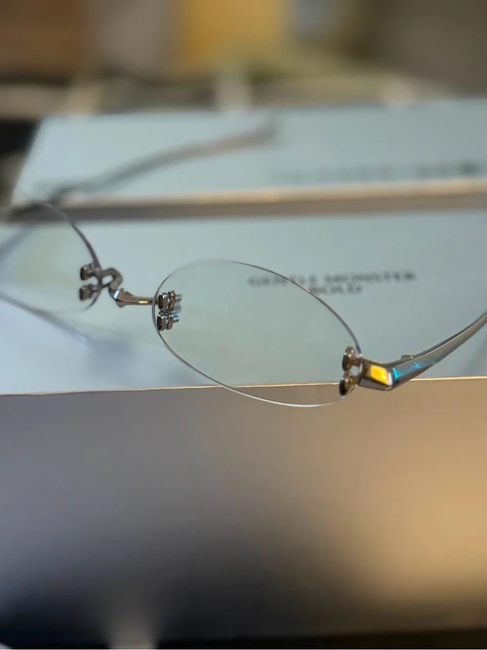 GENTLE MONSTER Furi Silver Rimless Oval Clear Glasses